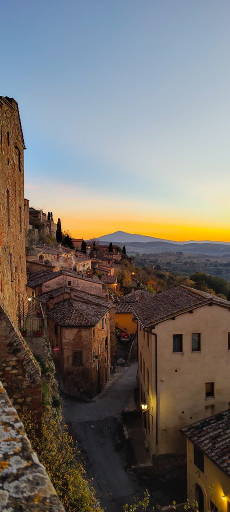 Italian hill town at sunset overlooking the countryside