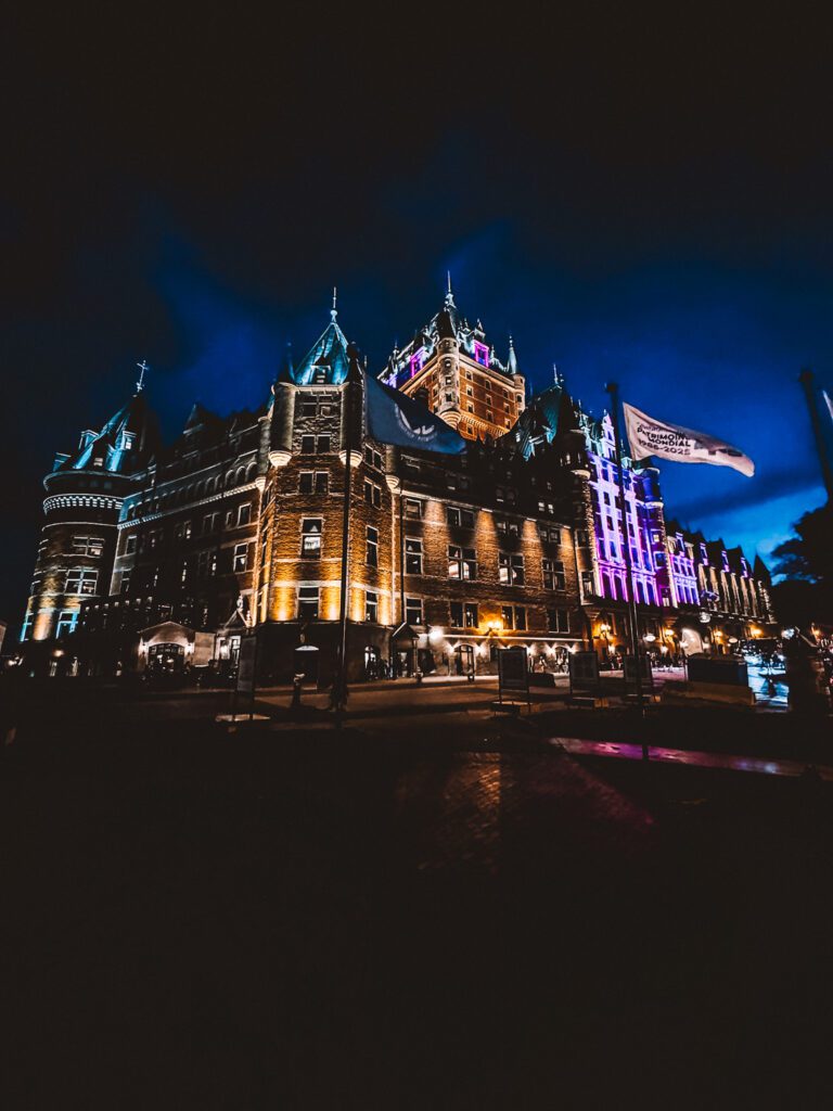 Fairmont Le Château Frontenac illuminated at night in Québec City