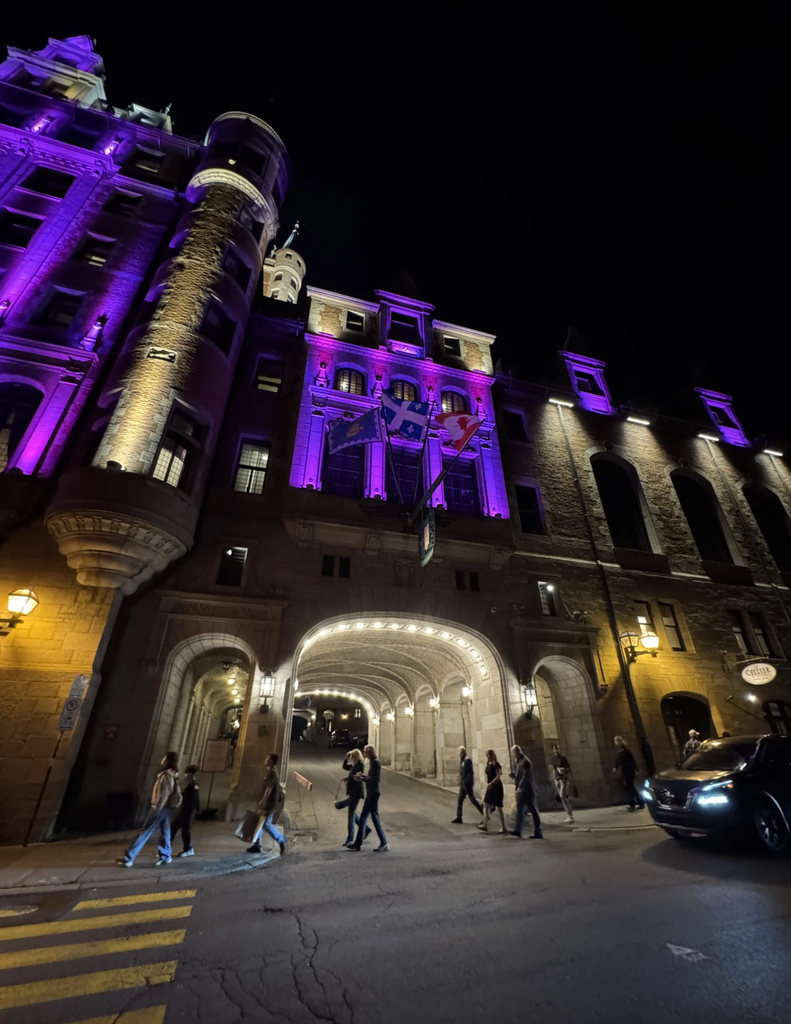 Fairmont Le Château Frontenac illuminated at night in Québec City