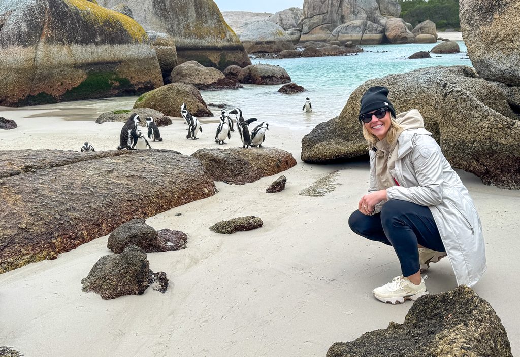Travel advisor Amanda Dante visiting African penguins at Boulders Beach near Cape Town, South Africa.