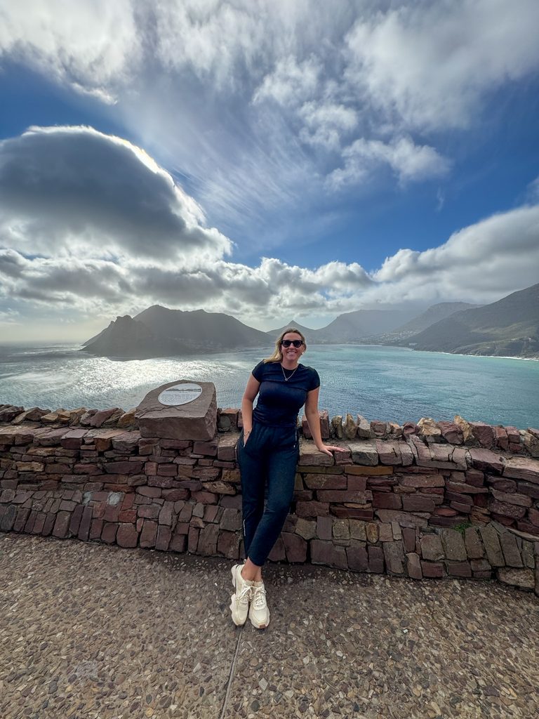 Travel advisor Amanda Dante overlooking Hout Bay and the mountains in Cape Town, South Africa