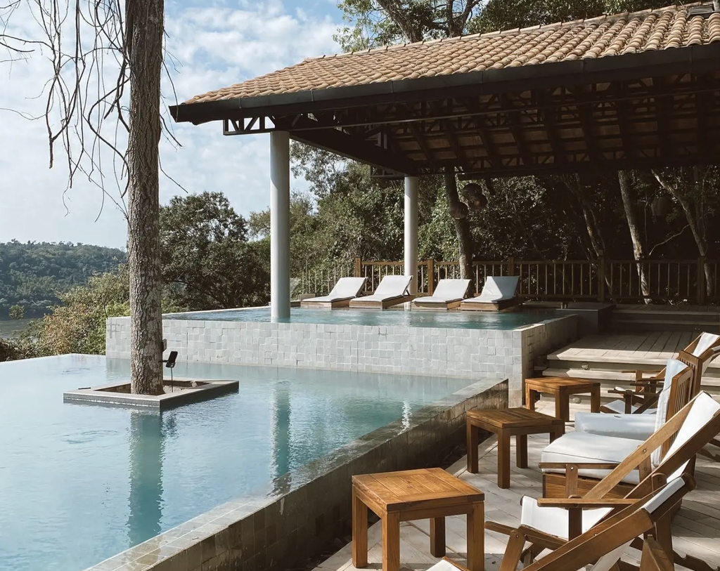 Infinity pool and lounge area at a resort in Guanacaste, Costa Rica